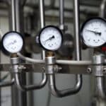 Pressure Gauge And Metallic Stainless Steel Pipes In Modern Dair